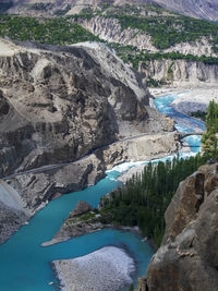 High angle view of rocks by river