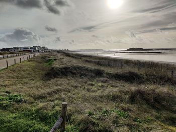 Scenic view of beach against sky