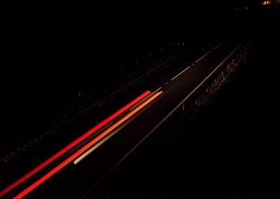 Light trails on road at night