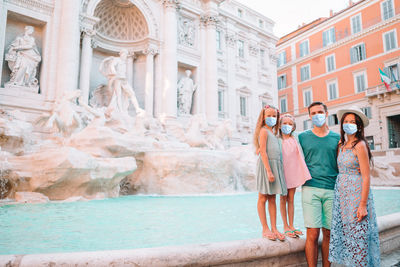 Group of people in front of building