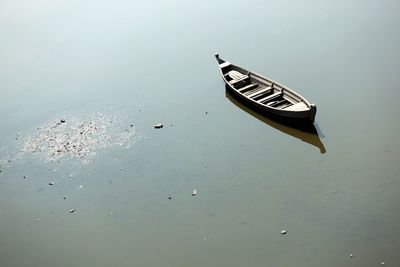 High angle view of boat moored on sea