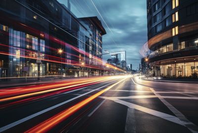 High angle view of light trails on road at night