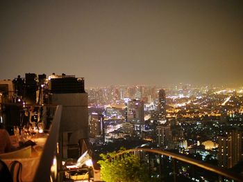 Illuminated cityscape at night