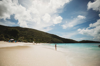 Caribbean vacation with kids girl playing on the beach