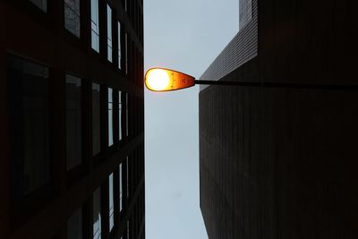 Low angle view of building against sky at sunset