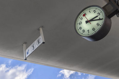 Low angle view of clock tower against sky