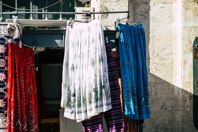 Clothes drying on clothesline by building