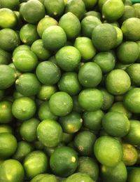Full frame shot of limes in market