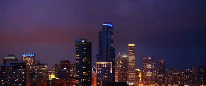 Illuminated cityscape at night