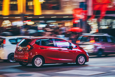 Cars on street at night