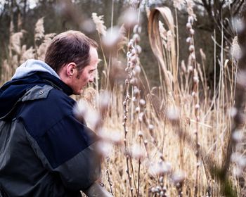 Man standing in long grass