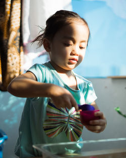 Close-up of girl playing