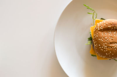 High angle view of burger in plate on table