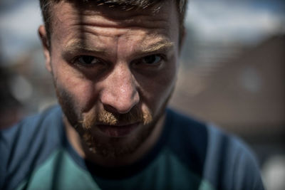 Close-up portrait of man standing outdoors