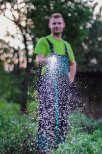 Portrait of a smiling girl standing outdoors