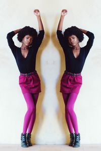 Multiple image of young woman standing against white wall