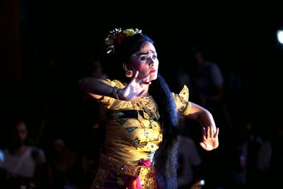 Beautiful woman performing traditional dance