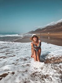 Portrait of young woman on beach