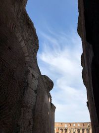 Low angle view of old ruin building against sky