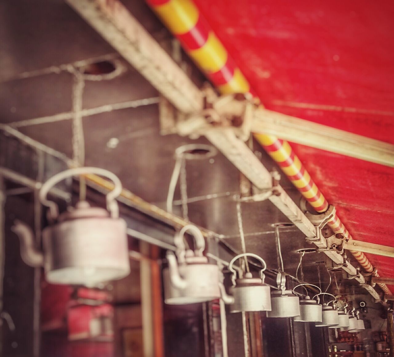 metal, red, industry, indoors, close-up, factory, metallic, selective focus, equipment, focus on foreground, machinery, machine part, low angle view, pipe - tube, in a row, no people, rusty, hanging, still life, old