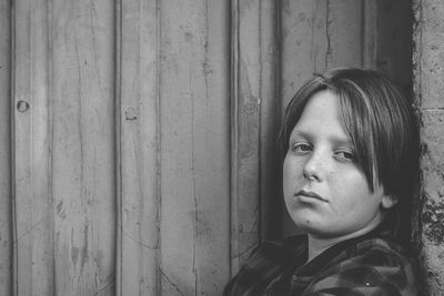 Portrait of young boy in black and white