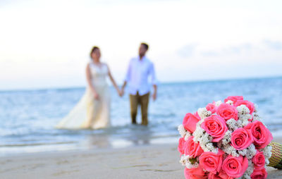 Couple kissing on beach