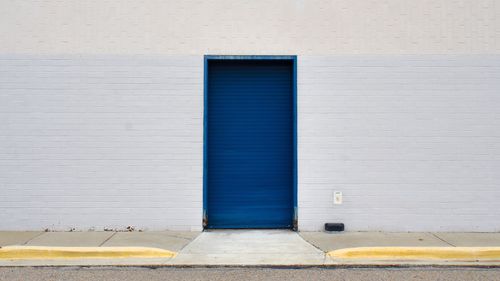 Blue closed door of shutter