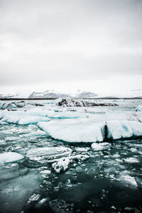 Scenic view of frozen sea against sky