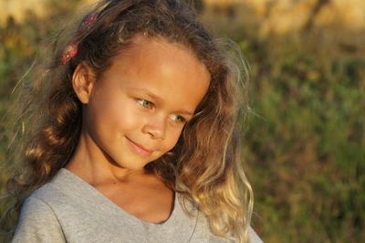 Close-up portrait of smiling girl