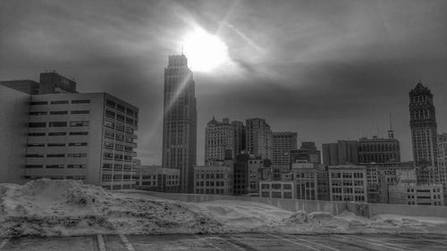 Buildings in city against sky