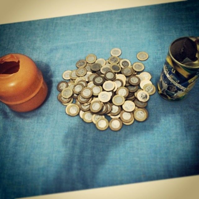 indoors, table, still life, high angle view, close-up, wood - material, food and drink, variation, large group of objects, arrangement, choice, no people, auto post production filter, selective focus, bottle, technology, equipment, abundance, order, medium group of objects