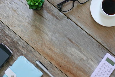 High angle view of coffee cup on table