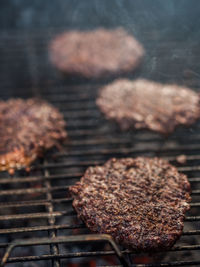 Close-up of meat on barbecue grill