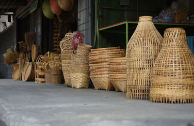 Stack of firewood for sale in market