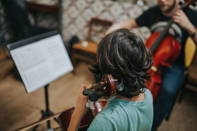 High angle view of people playing music in studio