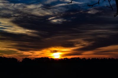 Scenic view of dramatic sky during sunset