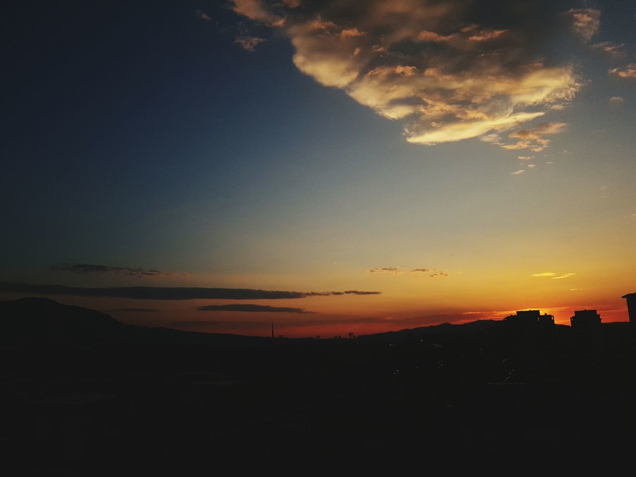 sunset, scenics, silhouette, tranquil scene, sky, beauty in nature, tranquility, orange color, idyllic, nature, cloud - sky, landscape, mountain, cloud, dusk, outdoors, no people, dramatic sky, copy space, majestic