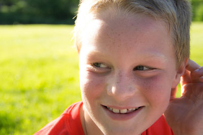 Close-up portrait of smiling boy