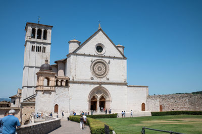 View of historic building against clear blue sky