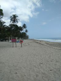 Scenic view of beach against sky