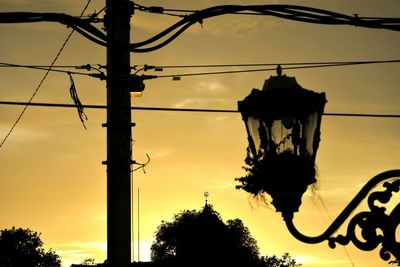 Low angle view of silhouette tree against sky during sunset