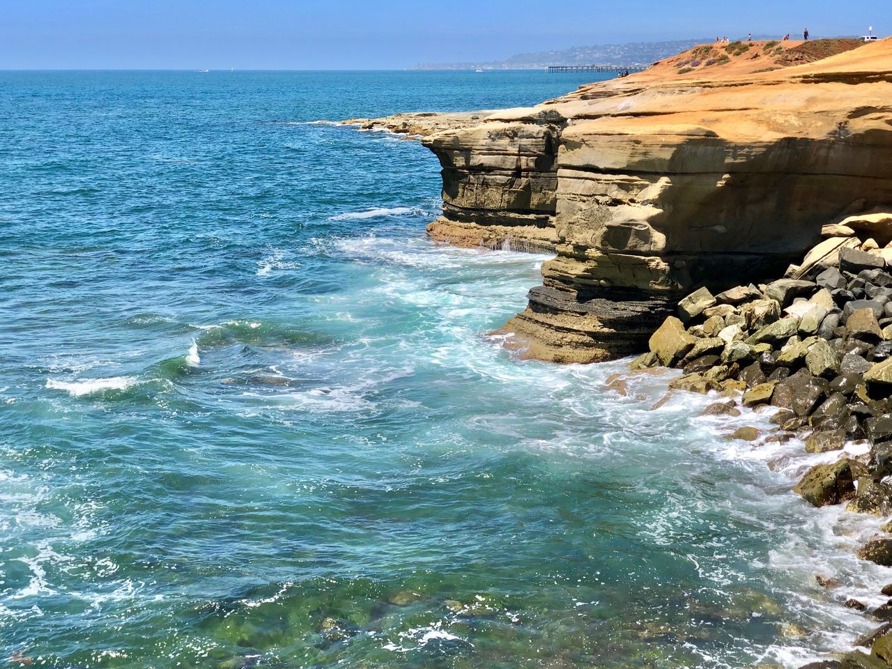 sea, water, rock, land, beauty in nature, scenics - nature, sky, nature, rock - object, solid, no people, day, aquatic sport, motion, wave, horizon, horizon over water, architecture, outdoors, breaking, rocky coastline