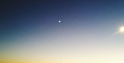 Low angle view of moon in sky