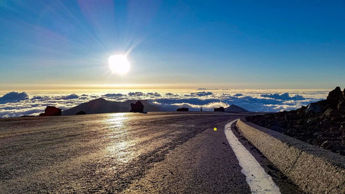 Panoramic view of road against sky during winter
