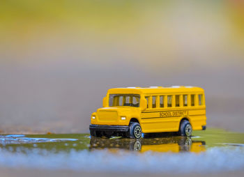 Close-up of figurine school bus 