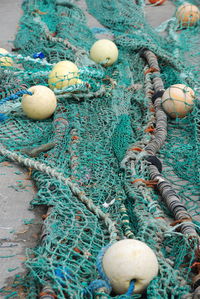 High angle view of fishing net on beach