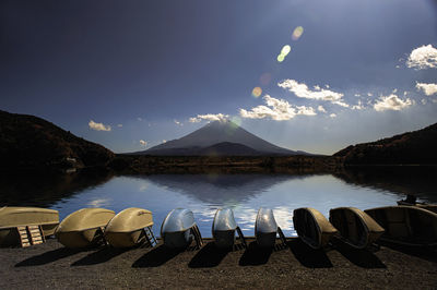 Scenic view of lake against sky at night