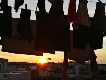 Clothes hanging against sky