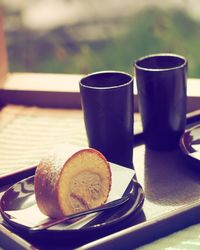 Close-up of coffee served on table