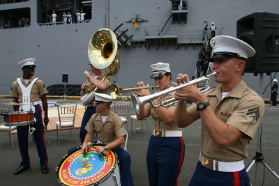 Group of people playing guitar at music concert